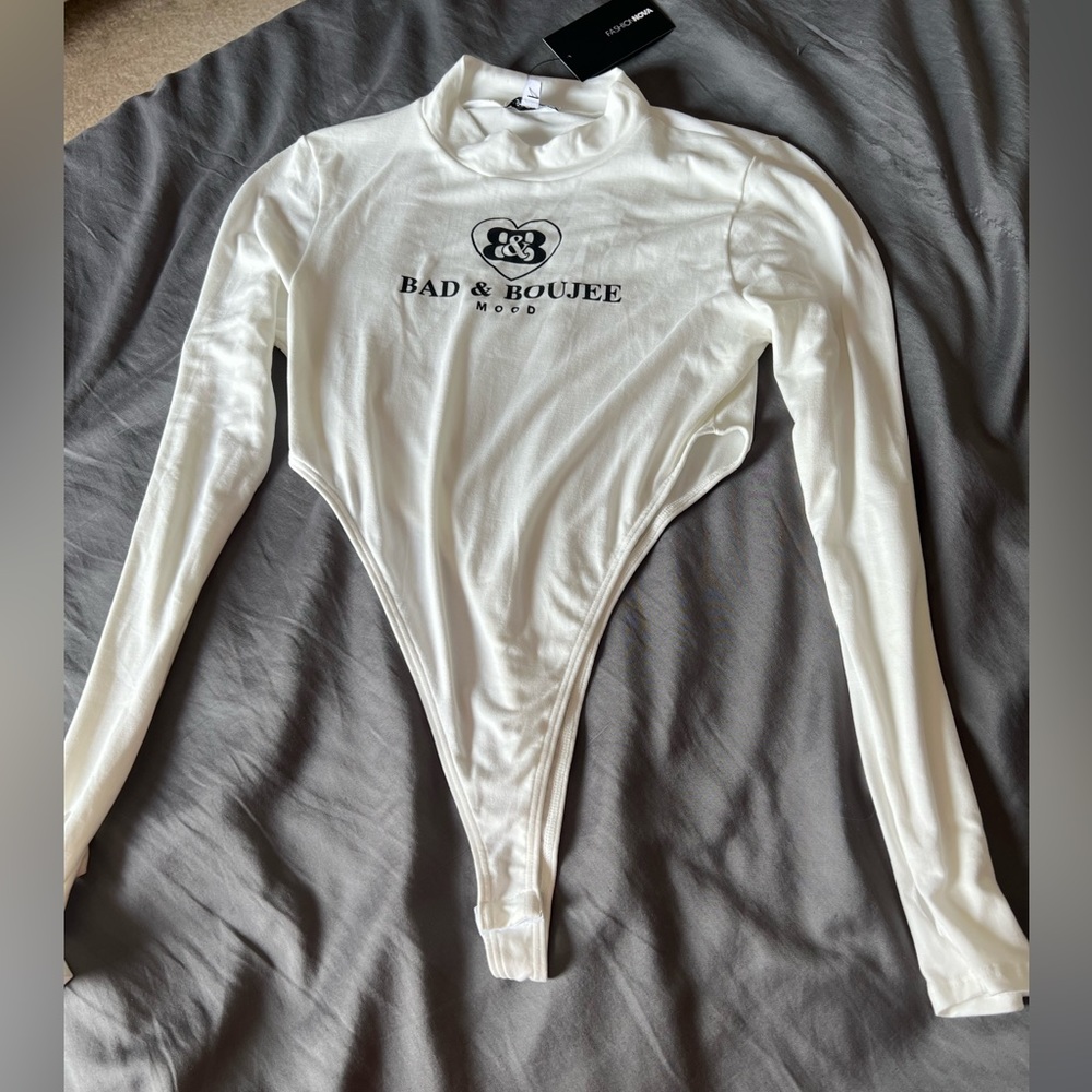 Fashion Nova white boujee high cut bodysuit. Size large.